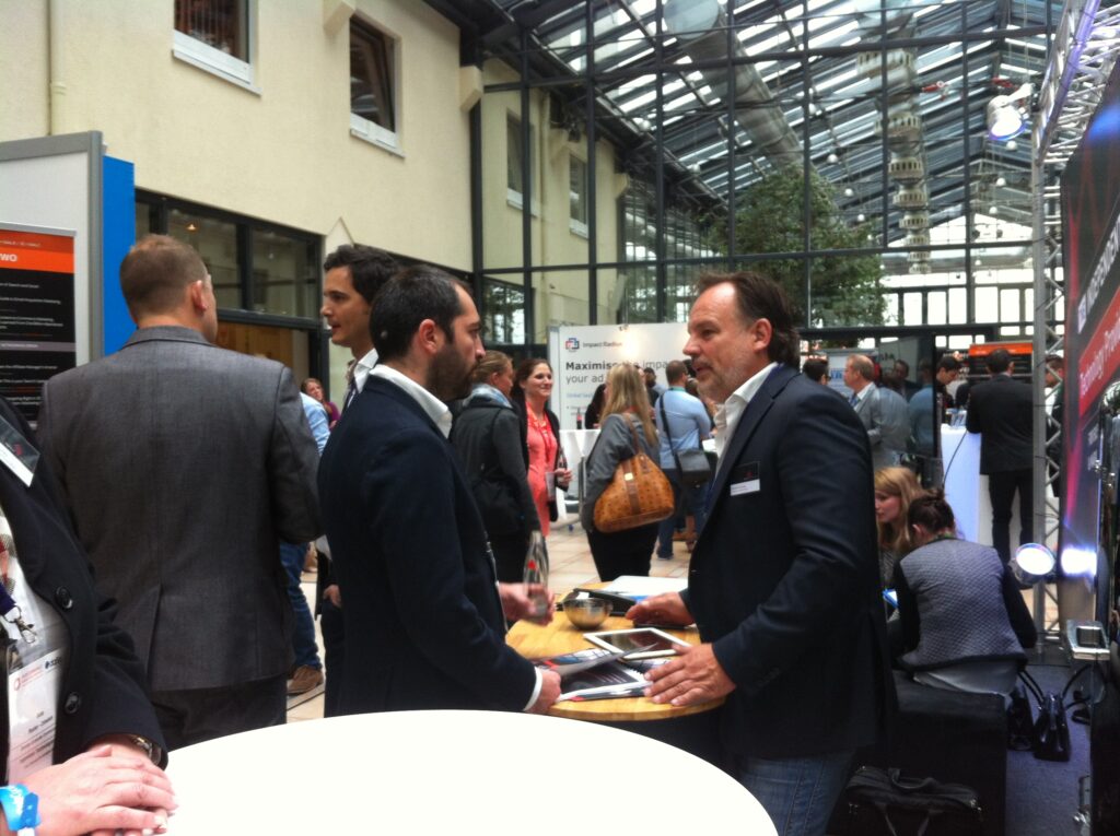 CEO Christian Kleinsorge speaks to an interested visitor about our Ingenious Enterprise can work for his company.